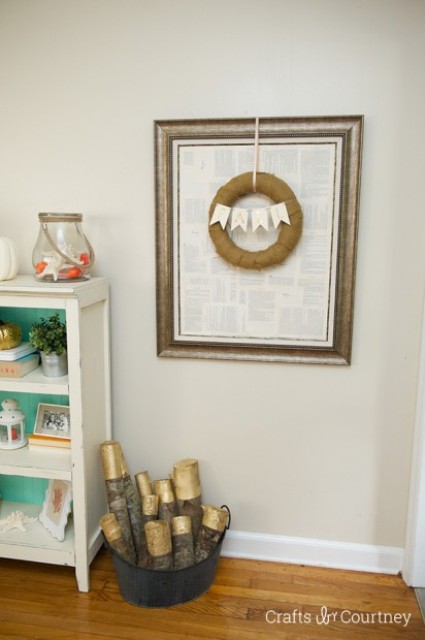 Picture Of diy gold painted logs for rustic decor  6