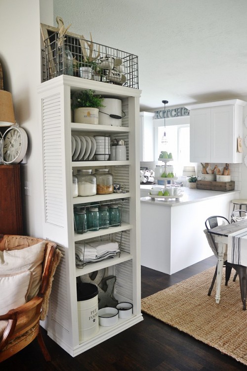 DIY Kitchen Bookshelf With Shutter Doors - Shelterness