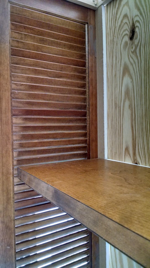 Picture Of diy kitchen bookshelf with shutter doors  5