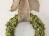 moss covered wreath with burlap
