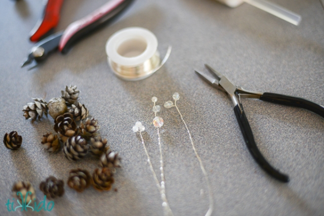 Picture Of diy pinecone and sparkling beads napkin rings  5