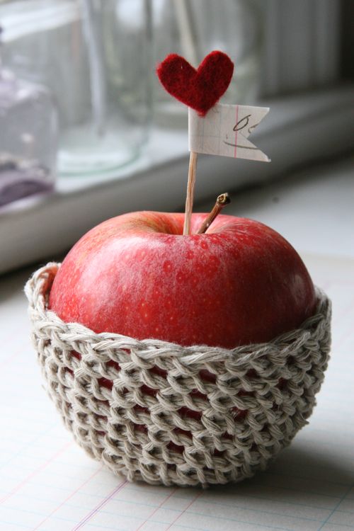 crocheted grey apple cozy