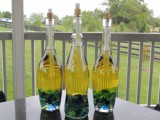 wine bottles tiki torches with crafting pebbles