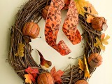 twig and faux pumpkin wreath