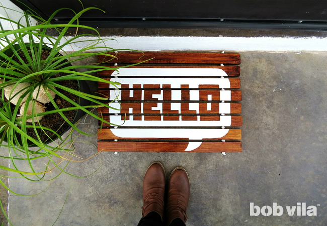 Diy wooden doormat with a cheery greeting  1