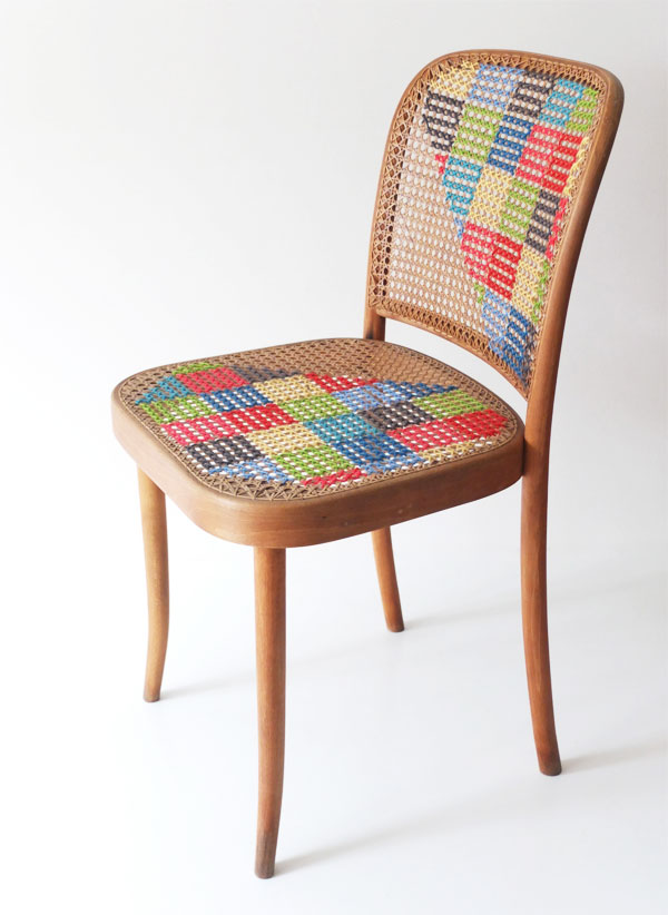 cross stitching an old chair