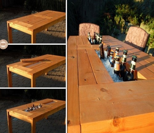 table with a drink cooler in the center (via theownerbuildernetwork)