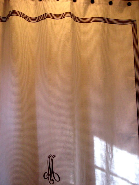 monogrammed shower curtain (via southernhospitalityblog)