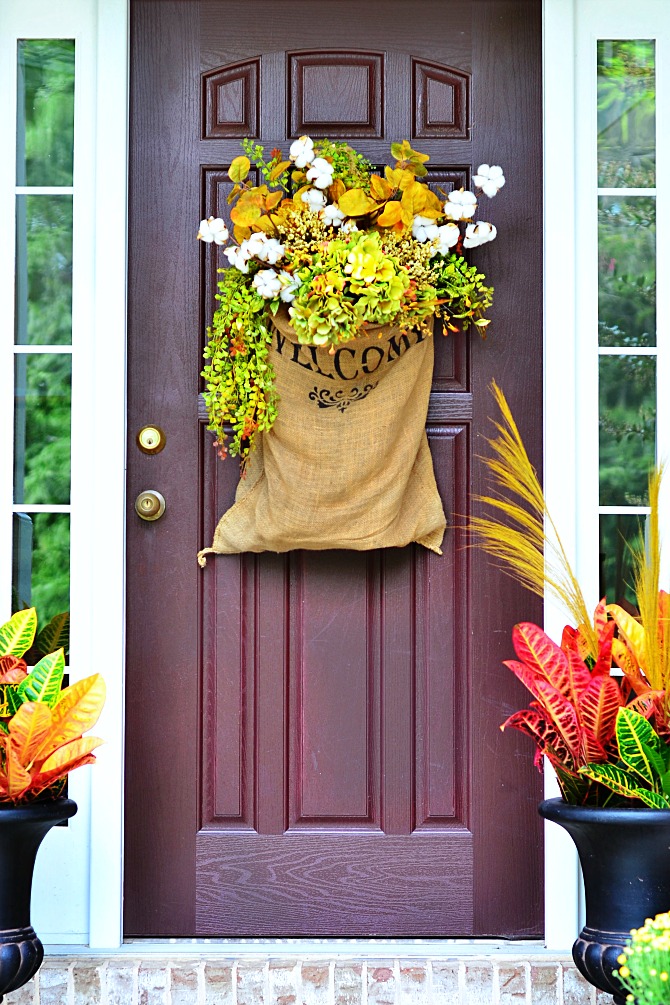 Faux plants are even better for decorating a front porch than real ones. There is no need to water them.