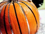 a glam pumpkin with sequin ribbons is a lovely decoration for the fall and it looks bright and fun