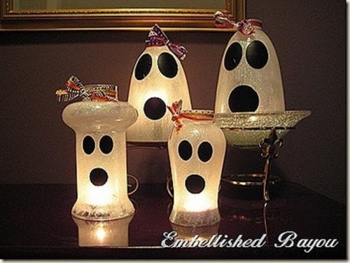 cloche and lamps styled as ghosts are scary and chic kid party decorations you can DIY