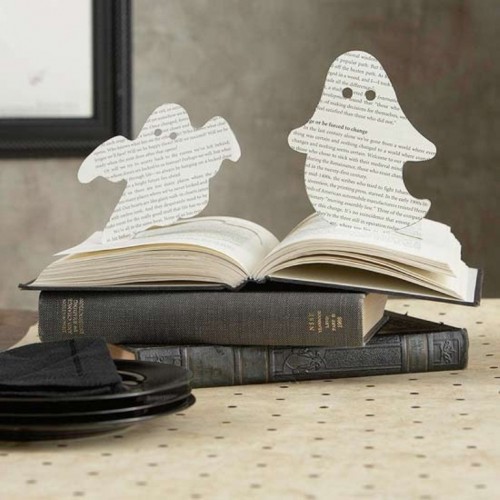 paper ghosts cna be made fast and attached anywhere you want to add a Halloween feel to the space