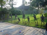 skeletons practicing and training are an amazing Halloween decoration for outdoors, steal this idea