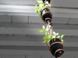 reused wine bottle herb planter