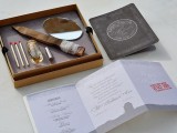 a scary party invitation box with matches, a mirror, a knife and an invite inside is a cool idea