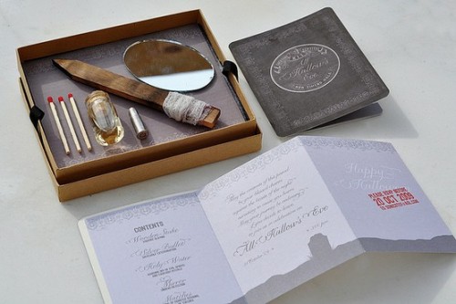 a scary party invitation box with matches, a mirror, a knife and an invite inside is a cool idea