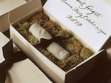 a box with moss and a cookie styled as a finger is a scary and yummy Halloween party invitation