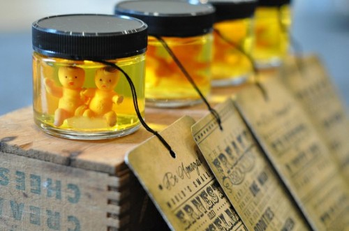 scary Halloween party invitations - mini dolls in jars with tags look really frightening