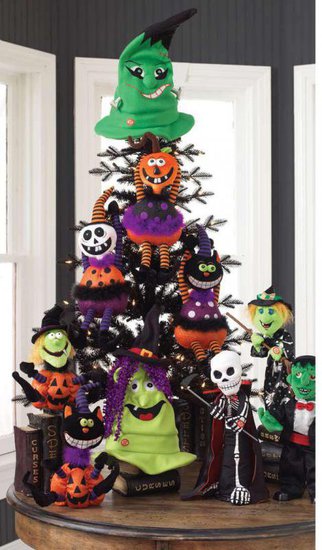 a black Halloween tree with colorful jack-o-lantern toys in purple, green, orange and white for Halloween