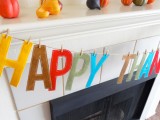 a Happy Thanksgiving garland made of bold letters is a nice solution with a modern feel and it looks bold