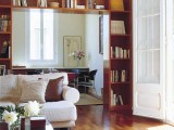 cover the doorway with a large bookcase for storing anything you want and you like