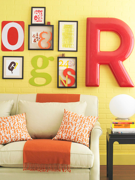 Using letters is also an interesting idea for a picture wall because decorating walls with pictures shouldn't be boring