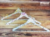 how-to-upcycle-wooden-coat-hangers-with-vintage-paper-1