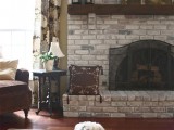 traditional whitewashed brick fireplace