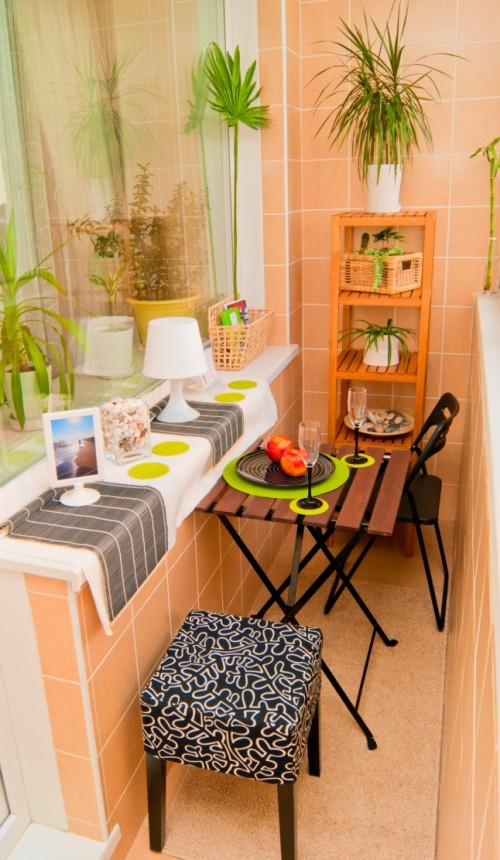 Tiny balconies work well to organize a little breakfast nook.