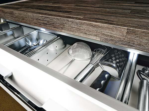 Slim kitchen utensils organizer should be somewhere by the cooktop.