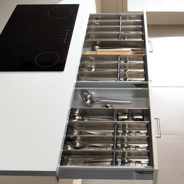 Metal kitchen utensils organizers are the best choices for top drawers.