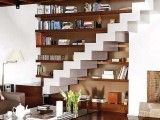 chic and simple open shelves under the stairscase that are continued over the stairs will save some space