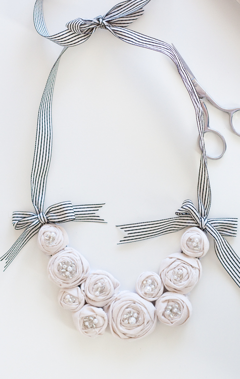 rosette bib necklace