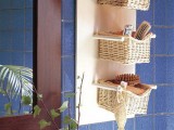 a wooden shelf with holders and some baskets placed on them will give you storage space and will make the space feel more rustic