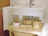 wicker cubbies for storage and small baskets with lids for various stuff are perfect for giving a slight farmhouse feel to the space