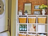 a large open storage unit with wicker cubbies that allow comfortable storage of small things without cluttering the space