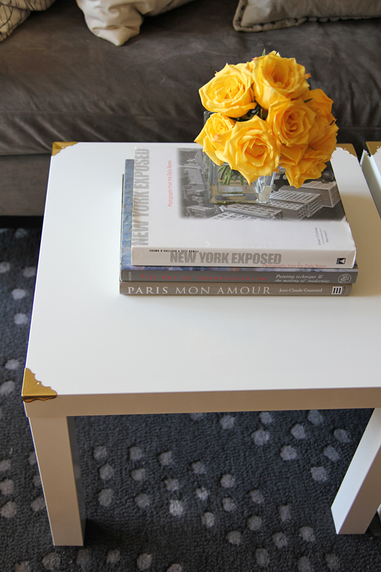 coffee table with brass corners (via ourchocolateshavings)