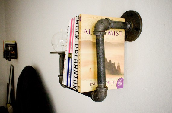 Pipe Bookshelf With Oil Candles