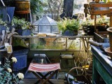 Potting Shed With A Cute Canvas Stool