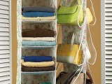 a floral fabric and sheer acryl bag holder for a closet is a real savior if you don’t have much storage space
