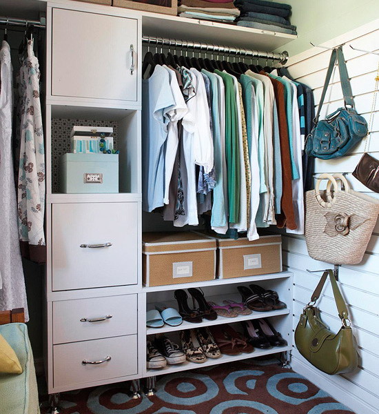 attach some hooks for your bags in your closet and you'll have much storage space free of clutter
