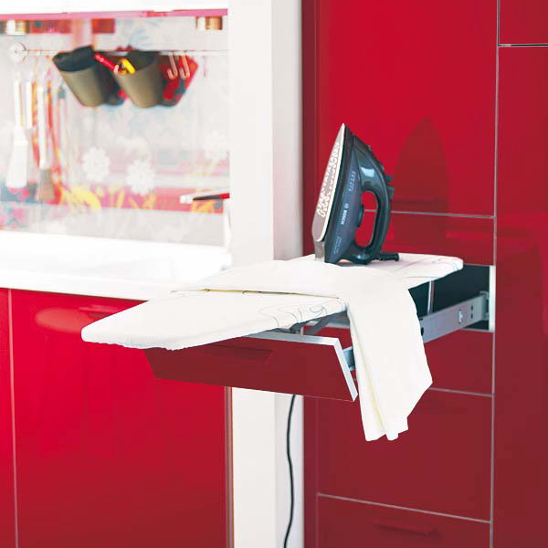 Did you know that a small pull out drawer could become a fully functional ironing board?