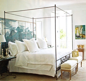 a painted screen with Chinese traditional motifs is a cool idea for adding chic and history to the space