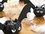 black bat pumpkins with eyes and wings are great for Halloween decor, they are fun and eays to make