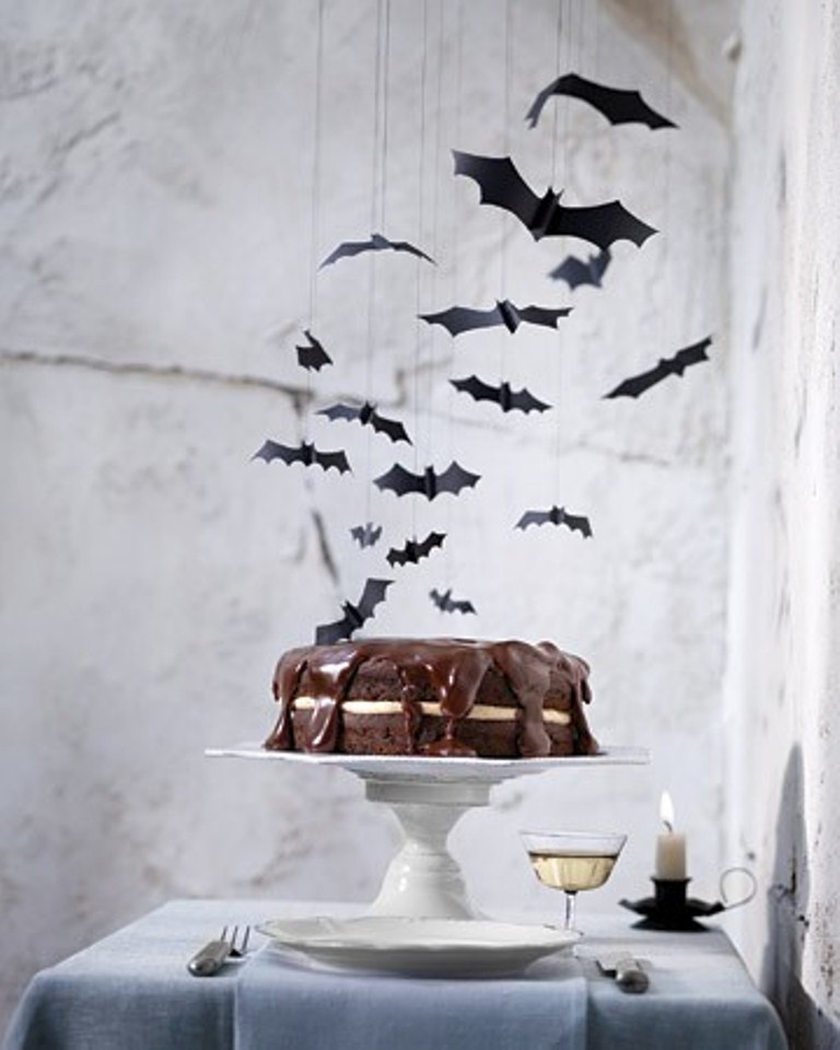 Hang some paper bats over your dessert table to make it scary without much effort and it will look cool