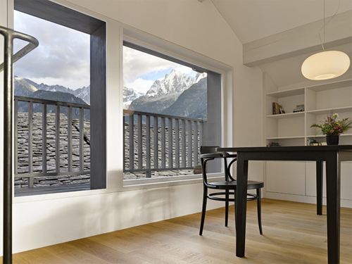 Swiss Alps Home Renovation Where Raw Materials Meet Modern Design