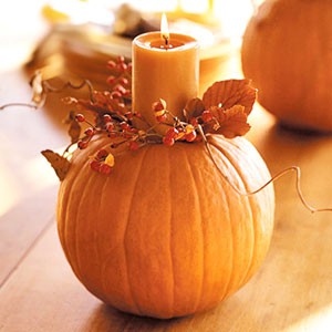 pumpkins with candles and berries are lovely fall decorations or centerpieces, pair them with something else