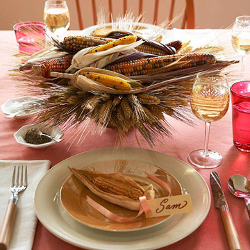 a stand with wheat and corn cobs is a simple harvest centerpiece that will fit Thanksgiving