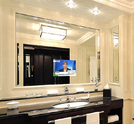 a TV in a mirror is a perfect solution for a bathroom, you will get two in one and that will be super comfortable