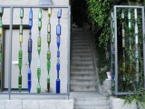 Unusual Fence Of Recycled Glass Bottles